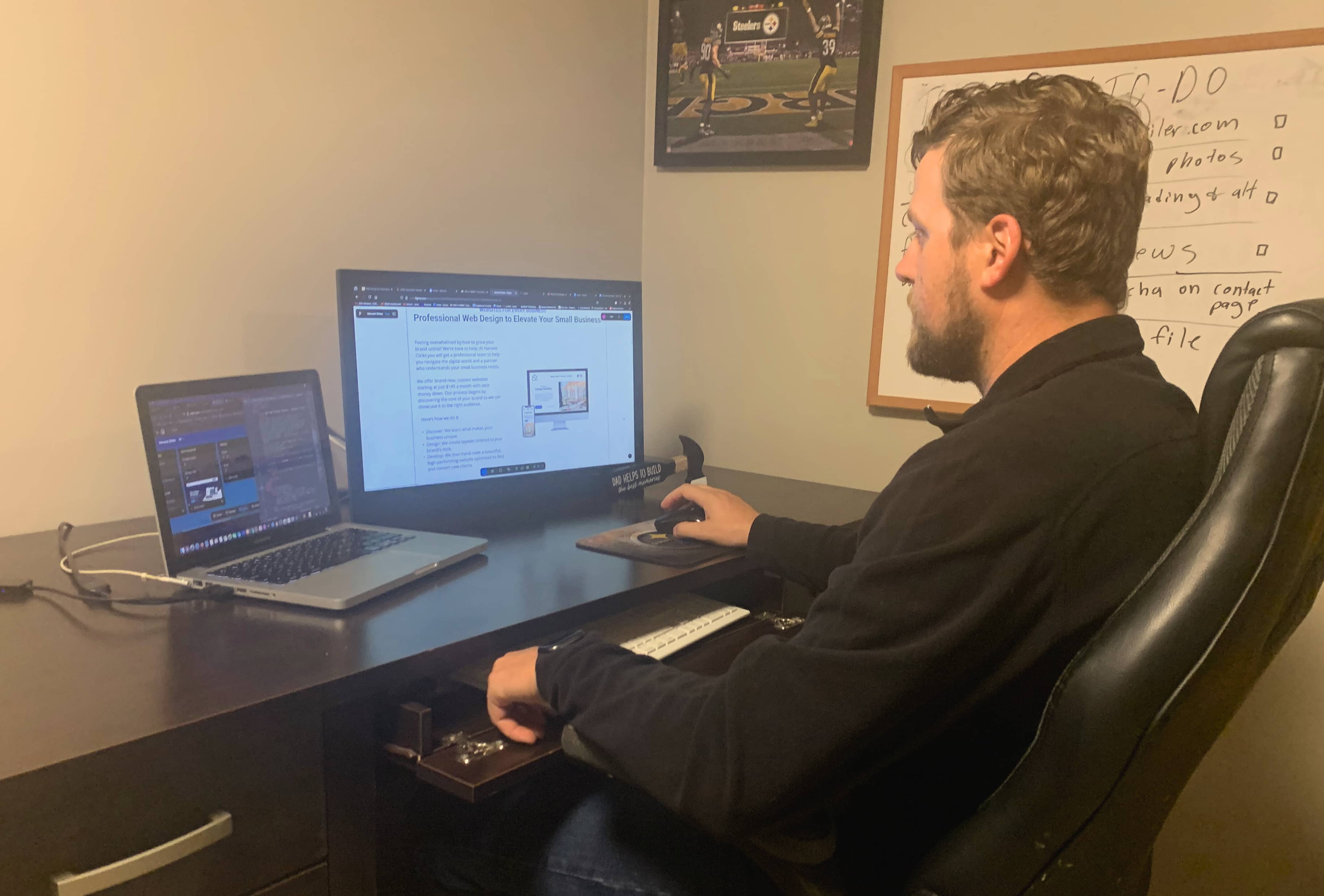 Andrew Beiler working on a web design