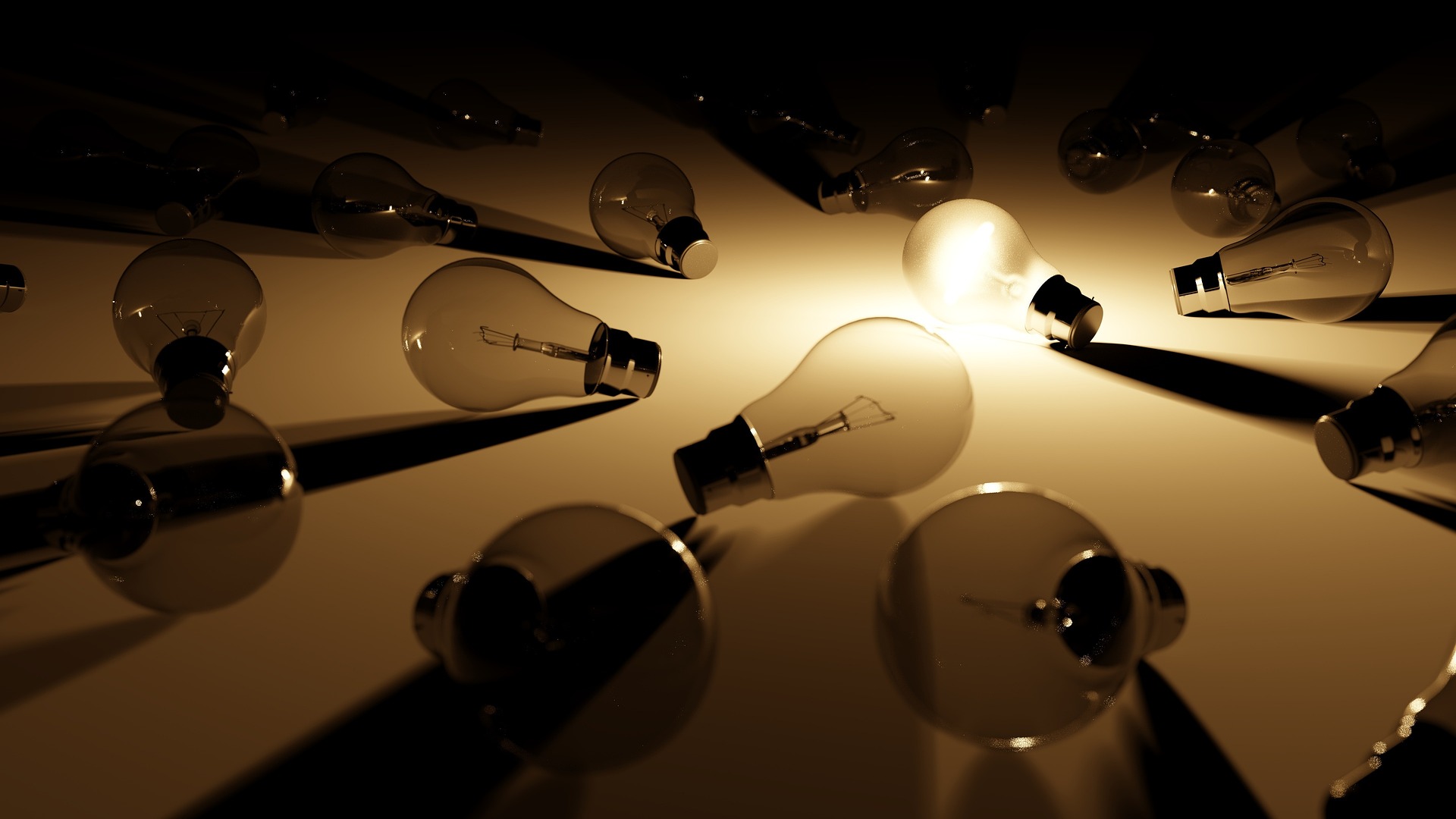 A single lit light bulb glowing among unlit bulbs, representing standing out in local search